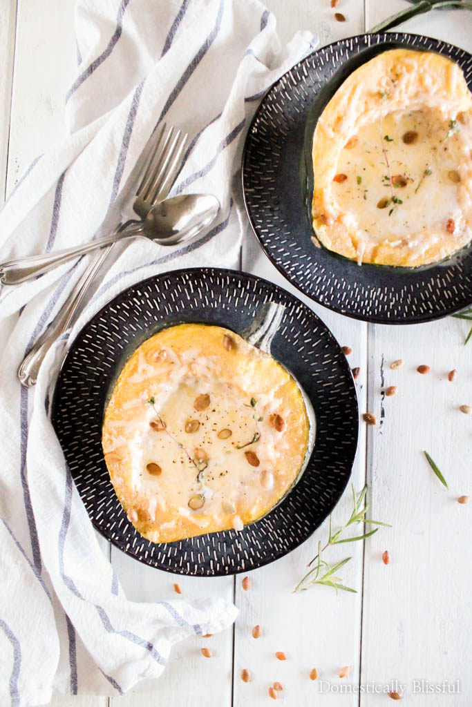 Creamy Baked Acorn Squash is a comforting seasonal dish that will warm & delight your taste buds with the flavors of fall. 