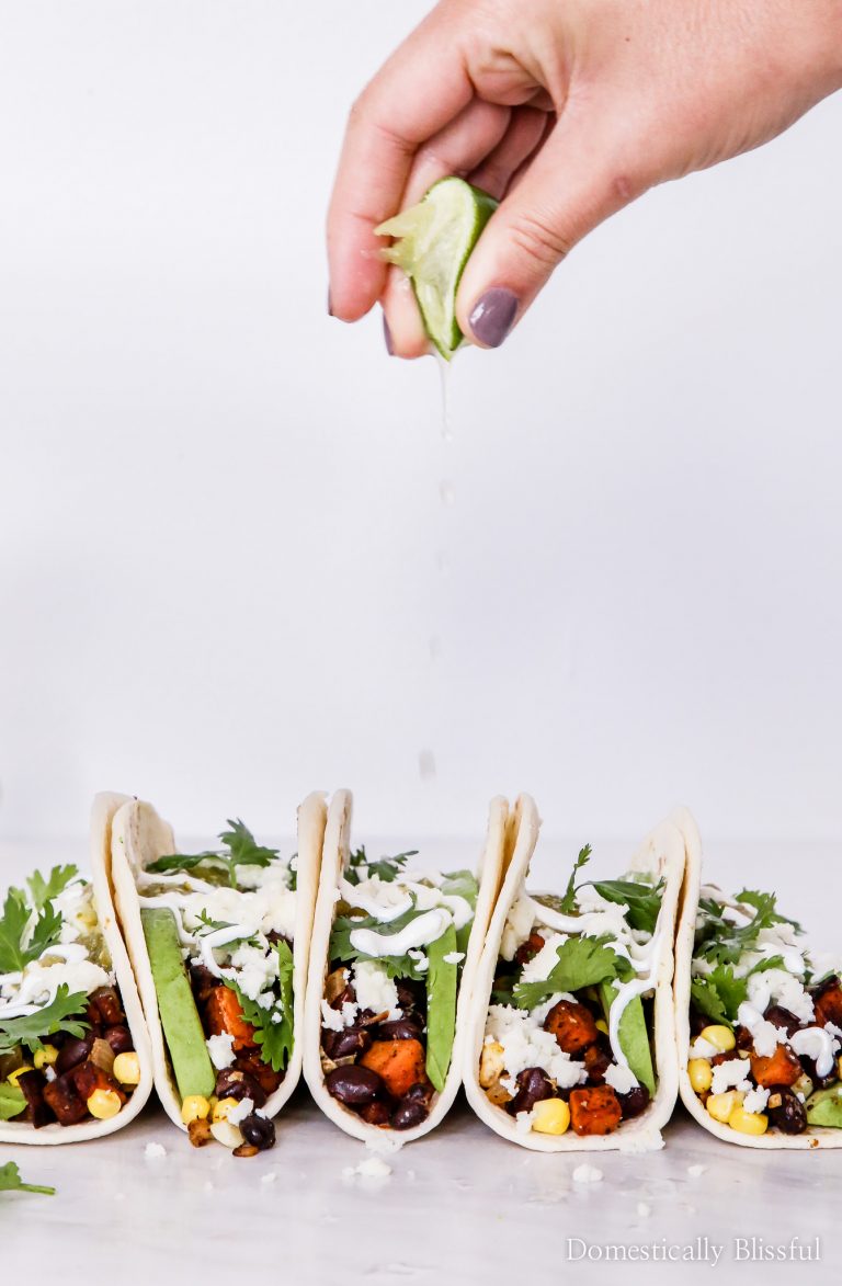 These Black Bean Sweet Potato Tacos are a fun way to add fall flavor to your favorite vegetarian Mexican dinner!