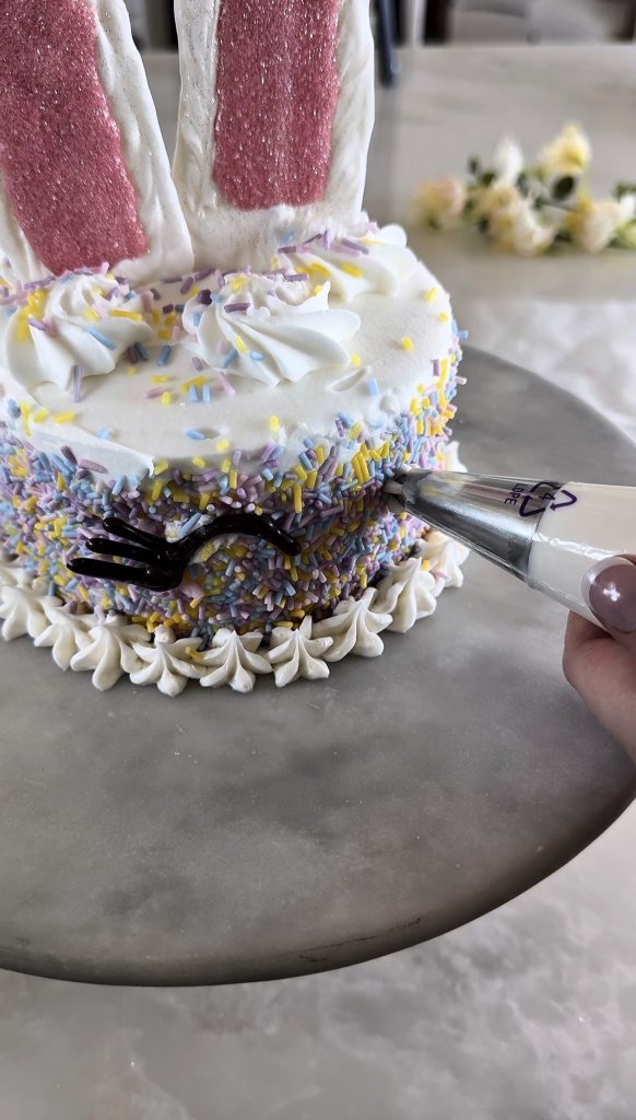 This Bunny Cake is a fun and super easy way to decorate a homemade or store-bought cake for a spring or Easter party.