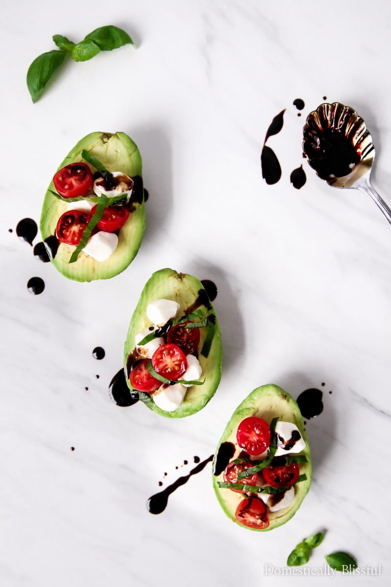 This Caprese Stuffed Avocado is the perfect little vegetarian appetizer for your next dinner party or date night at home.