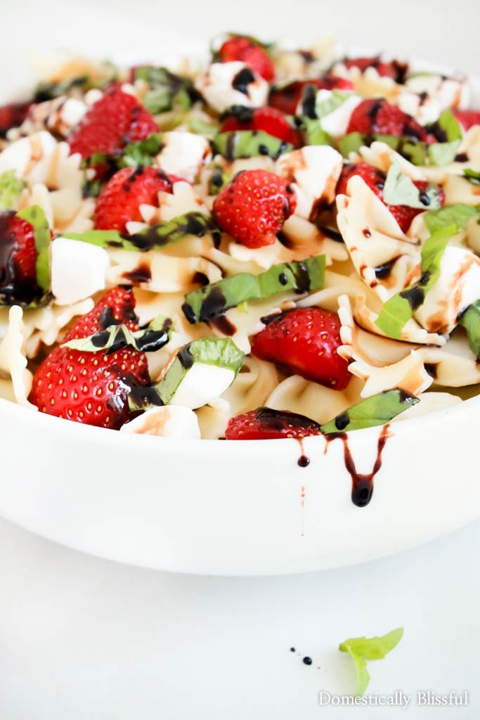 Strawberry Caprese Pasta Salad is overflowing with fresh flavor & is the perfect addition to any summer meal!