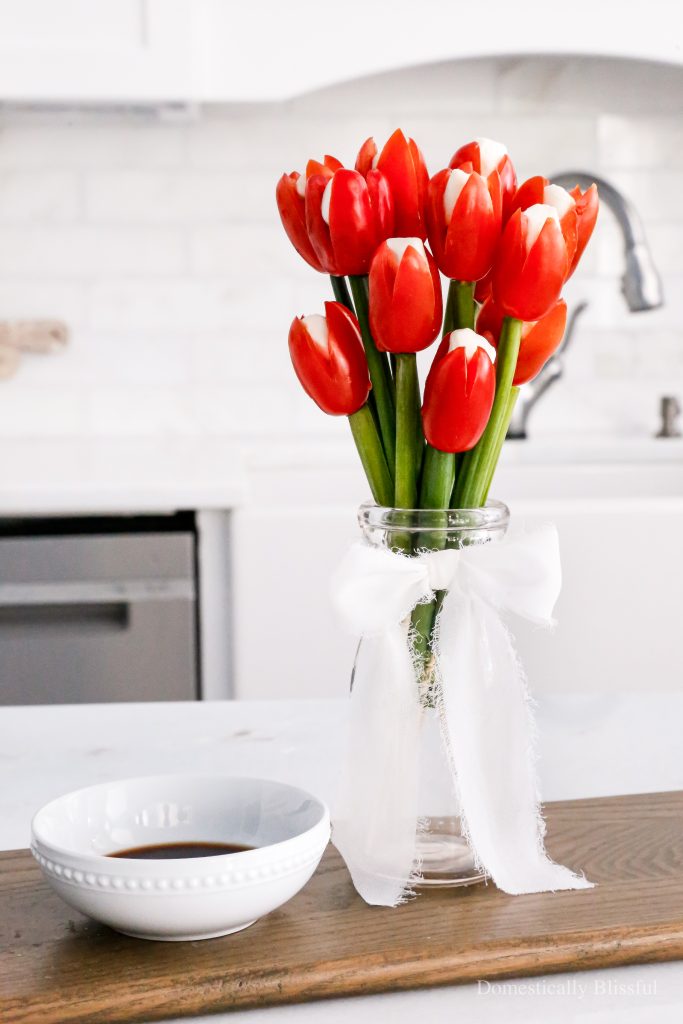 This Caprese Tulips Bouquet is made with grape tomatoes, mini mozzarella, and scallions.