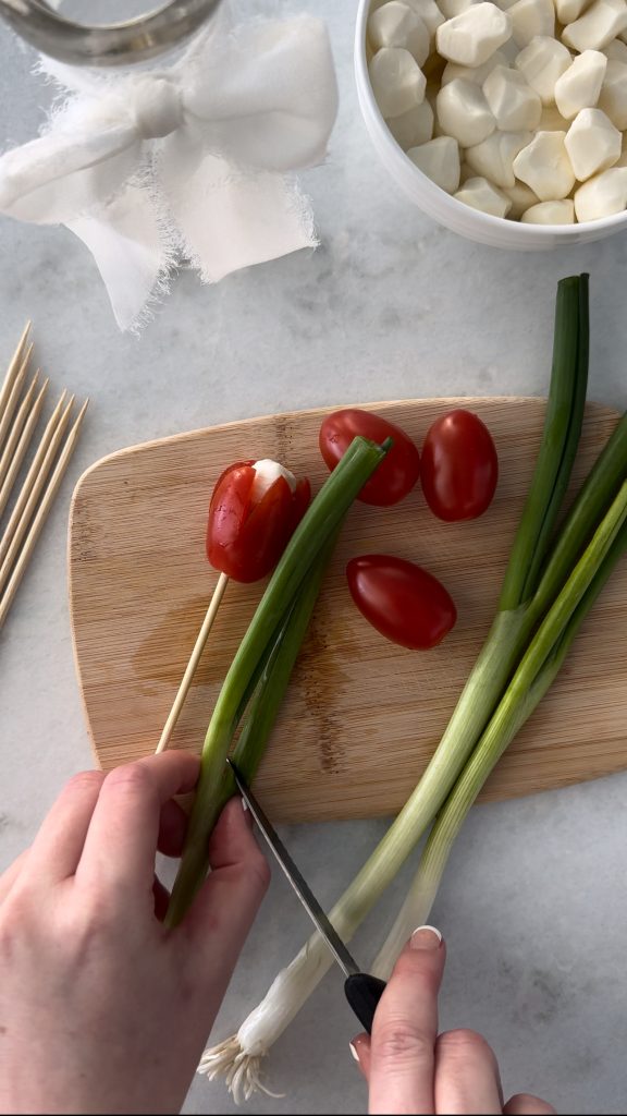 This Caprese Tulips Bouquet is made with grape tomatoes, mini mozzarella, and scallions.