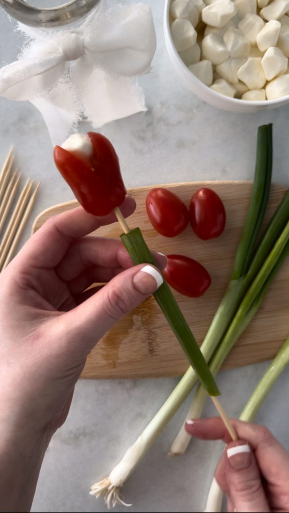 This Caprese Tulips Bouquet is made with grape tomatoes, mini mozzarella, and scallions.