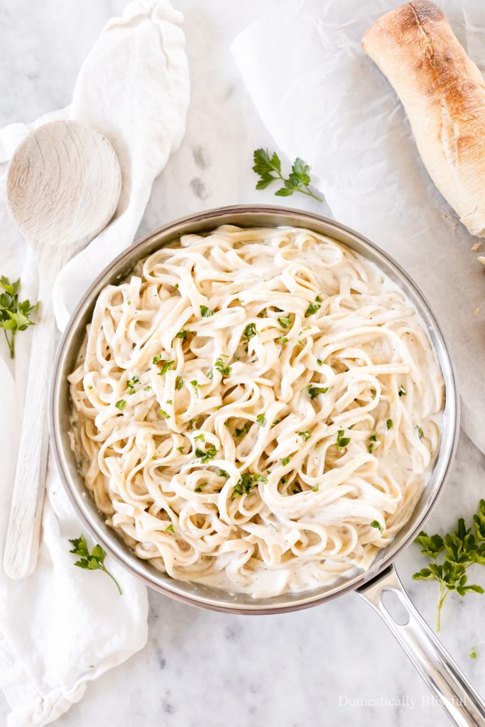 This homemade Creamy Alfredo Sauce is our family's favorite and has a secret ingredient you may not expect!