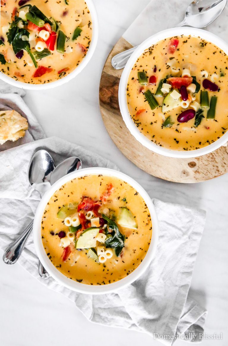 This Creamy Minestrone Soup is a delicious creamy twist on a classic soup recipe that is full of fresh vegetables.