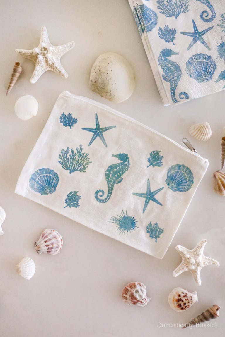 This DIY Beach Napkin Makeup Bag is a fun and inexpensive way to makeover a makeup bag for a beach trip.
