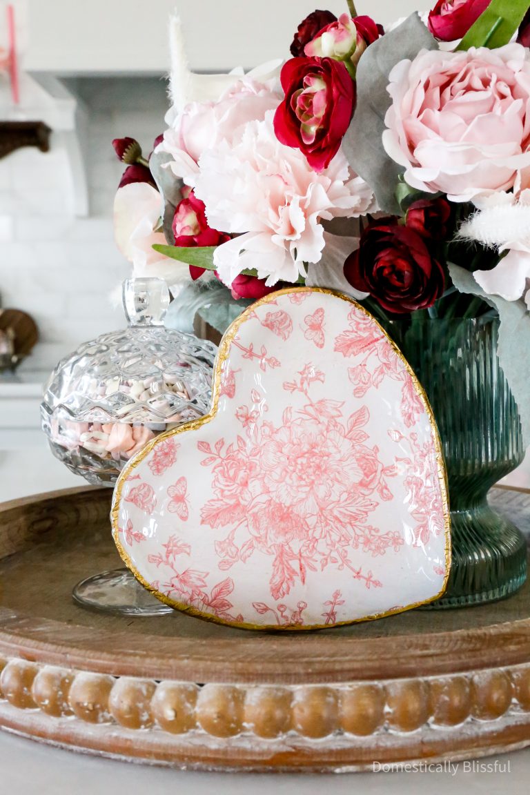 This DIY Clay Napkin Heart Trinket Dish is a fun Galentine's Girls Night craft that makes beautiful Valentine's Day decor for your home.