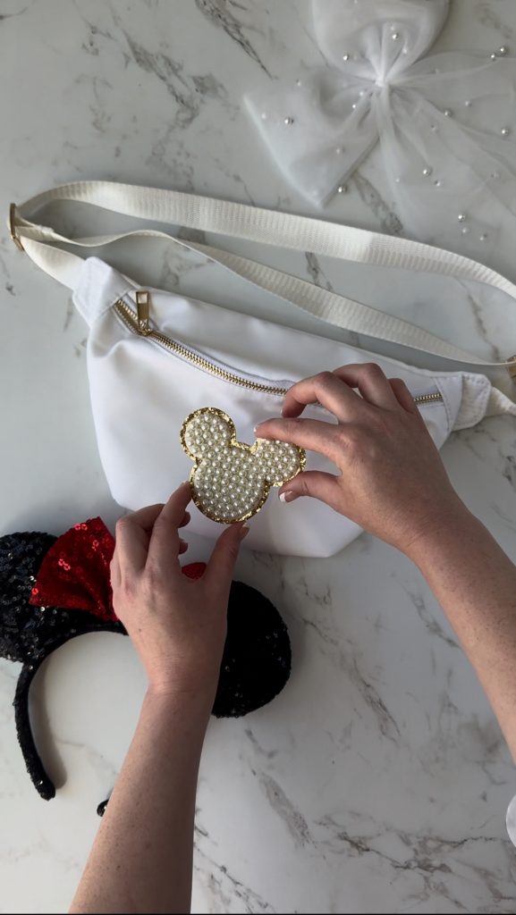 A DIY Disney Bag with a pearl Mickey Mouse patch to take on your next Disney World Vacation.