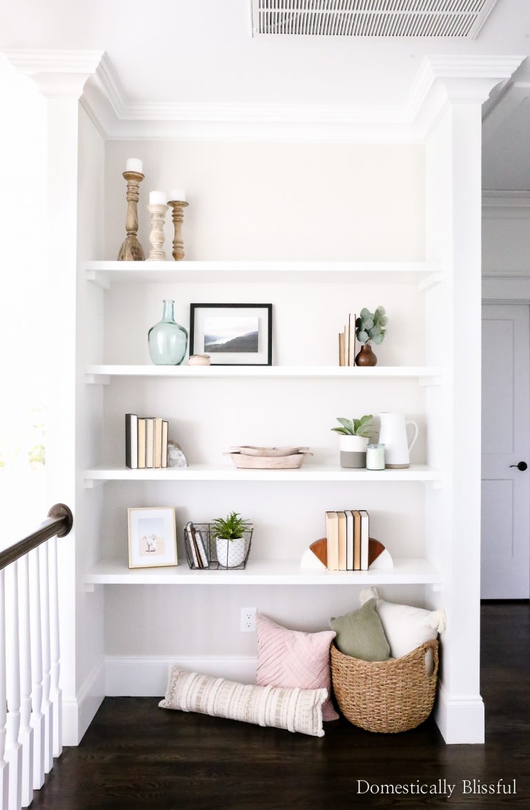 These DIY Wall to Wall Floating Shelves are easy to create and a beautiful way to add a statement wall to your home.