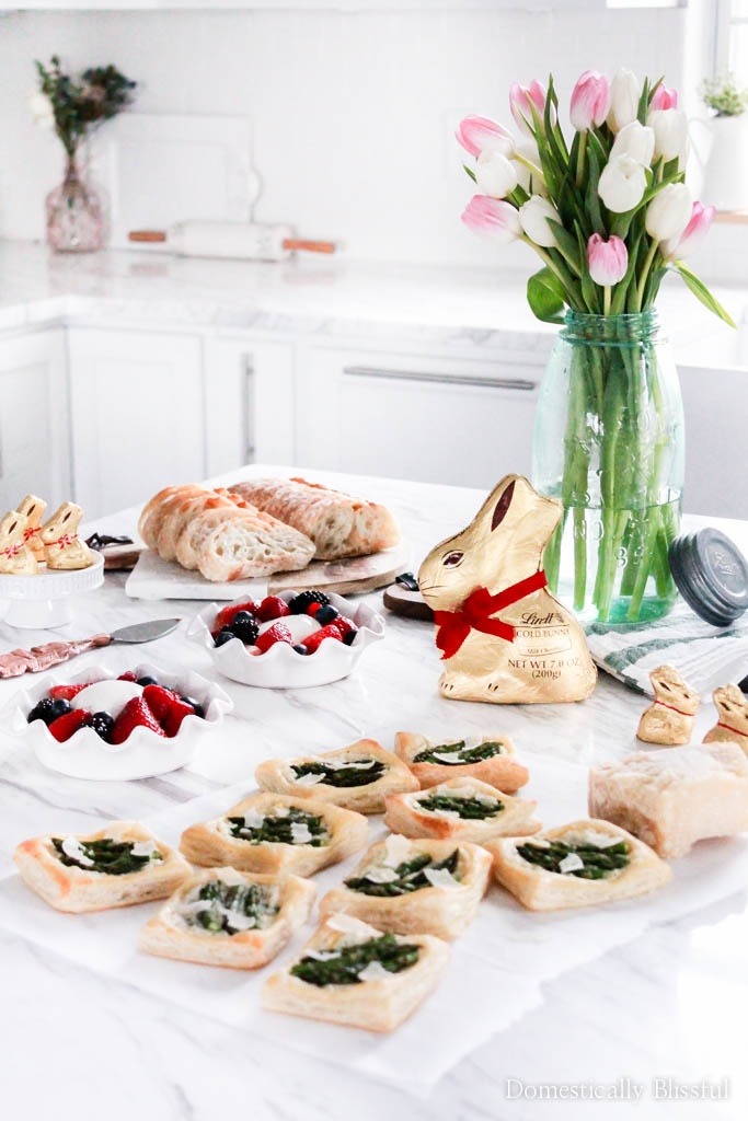 These Creamy Ricotta Asparagus Tarts are the perfect spring appetizer for your Easter party.