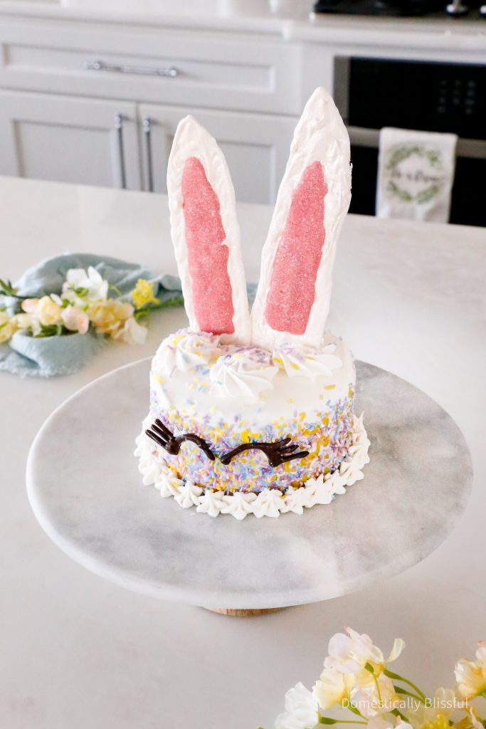 This Bunny Cake is a fun and super easy way to decorate a homemade or store-bought cake for a spring or Easter party.