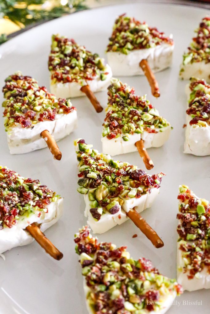 These Mini Cheese Christmas Trees can be made with only 4 ingredients, making it a super quick and easy Christmas appetizer for a holiday party.