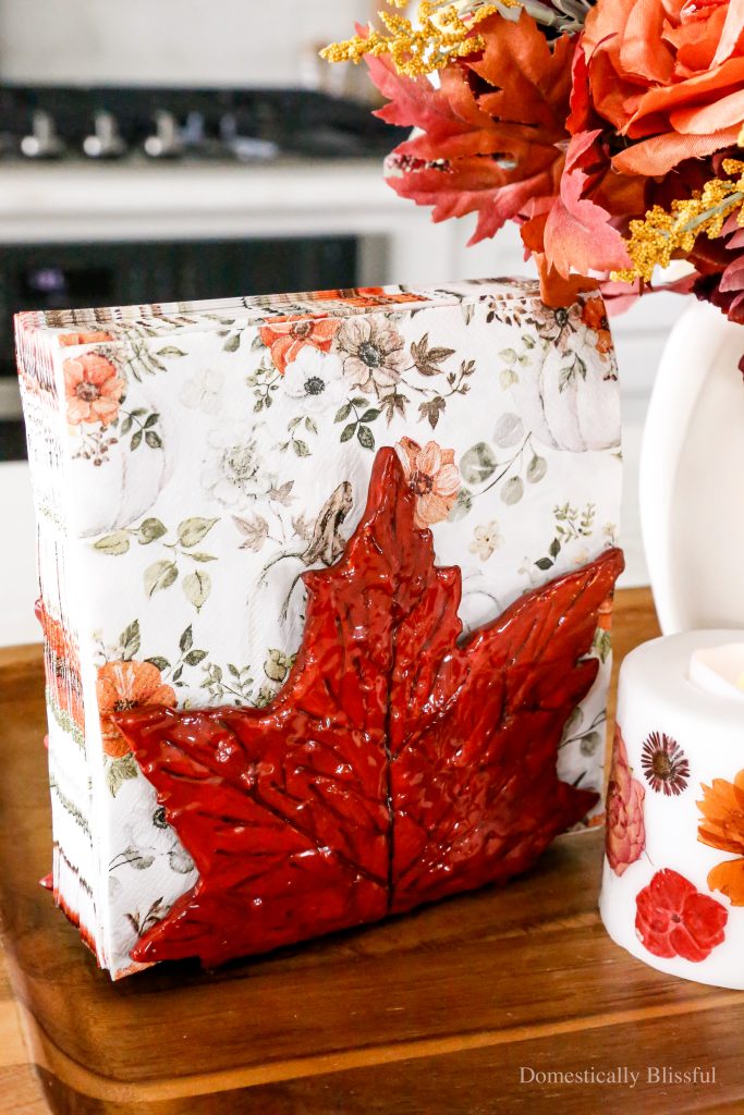 This DIY Clay Leaf Napkin Holder is a fun fall craft that makes a great gift and beautiful autumn decor for your kitchen.