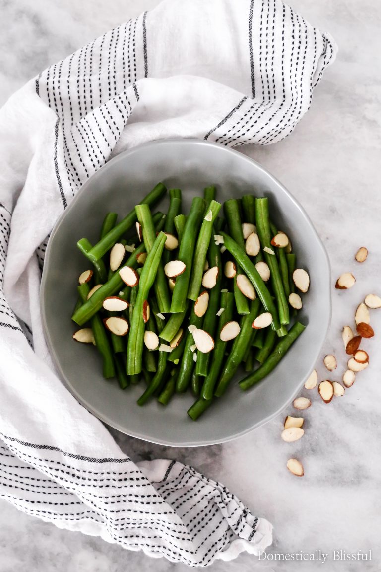 These Garlic Green Beans with sliced almonds are a family recipe that is easy to make in under 15 minutes and with only 5 ingredients.