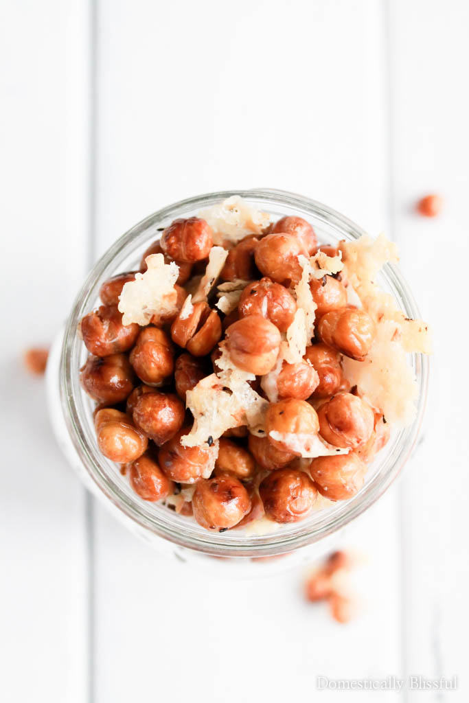 This Parmesan Garlic Roasted Chickpeas recipe is a quick & easy snack that is covered in crispy delicious flavor!