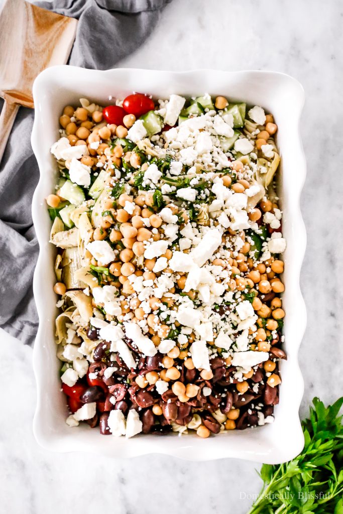 An easy Greek Pasta Salad you can make ahead of time this summer for an easy dinner or a flavorful party side dish.