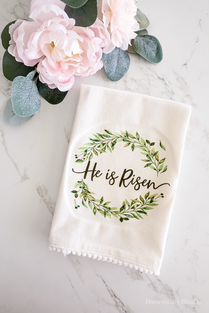 This DIY He is Risen Napkin Hand Towel is made with a napkin to create a beautiful Easter hand towel to enjoy this spring in your kitchen.