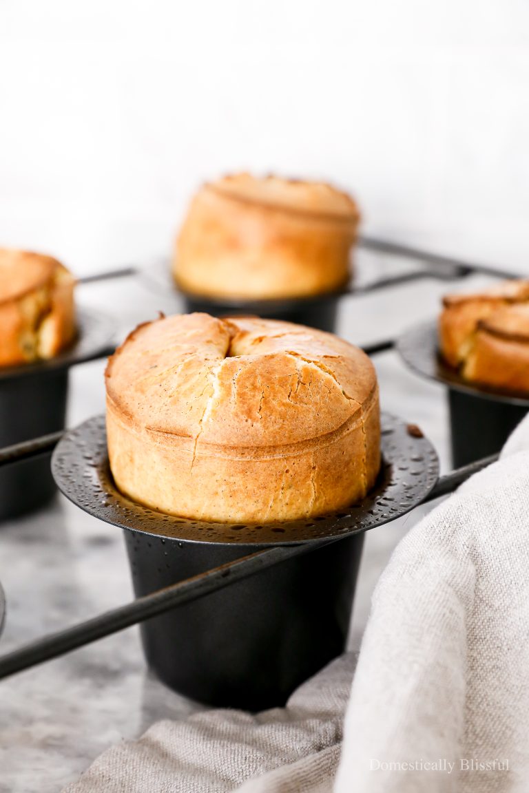A savory Herb Cheese Popovers recipe perfect for breakfast or brunch, simply blend and bake!