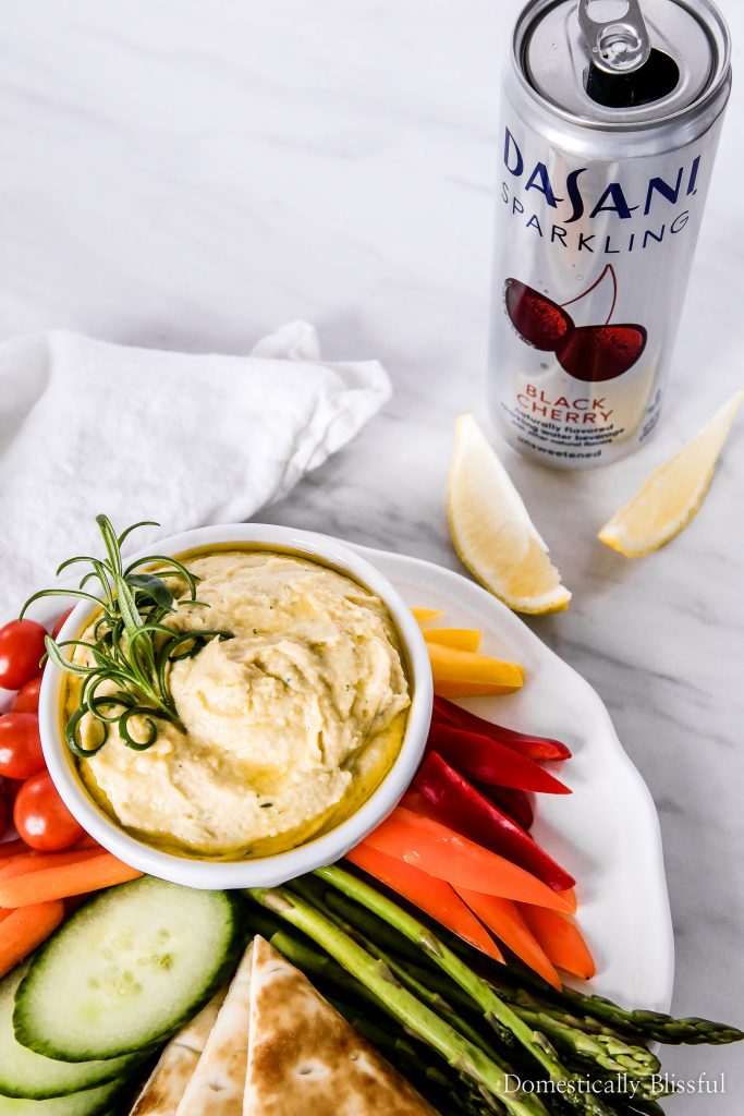 This Lemon Rosemary Hummus is bursting with fresh flavor & pairs perfectly with colorful vegetables & DASANI® Sparkling.