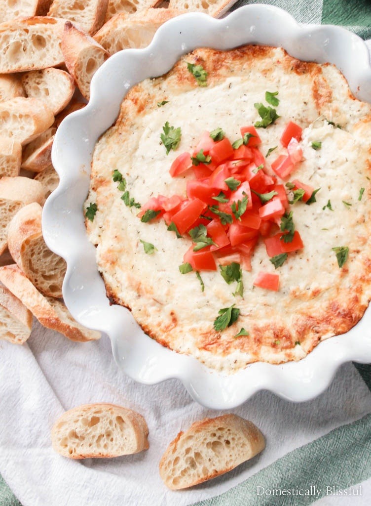 This Smoked Mozzarella Dip is filled with creamy flavors & is the perfect warm appetizer for any party or family gathering!