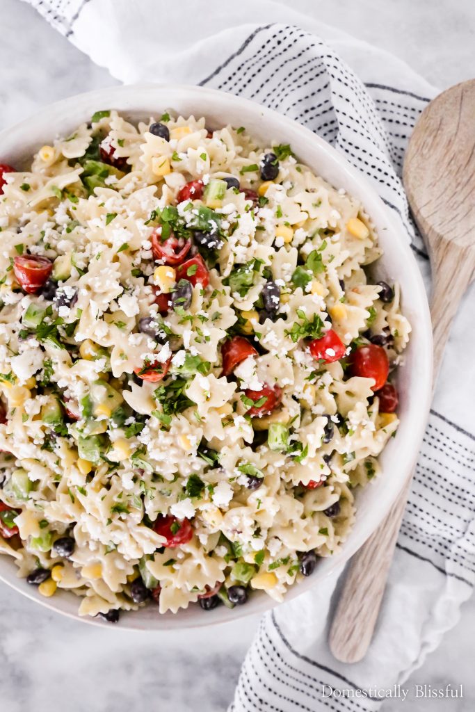 This Mexican Pasta Salad is a colorful vegetarian pasta recipe filled with fresh vegetables and topped with Panera Creamy Buttermilk Ranch+Dip at Publix.