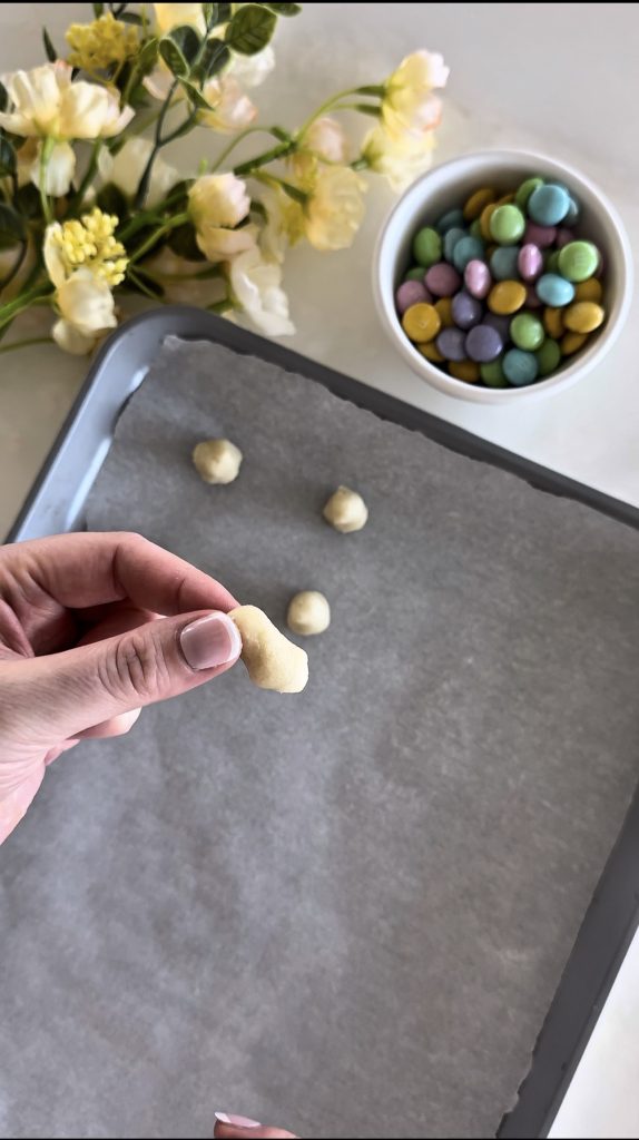 These Mini Bunny Sugar Cookies are made with pastel M&M's and are the perfect bite-sized dessert for an Easter brunch or spring party.
