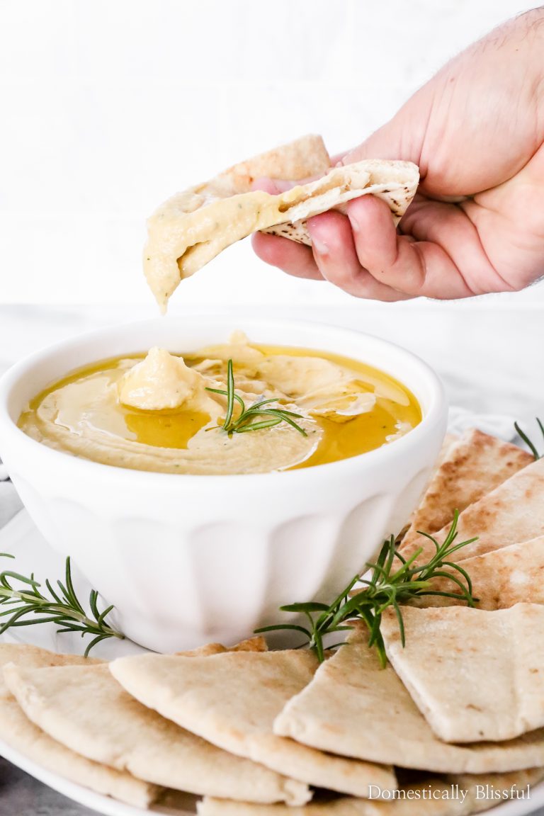 You only need 6 ingredients (no tahini) for this creamy Roasted Garlic Rosemary Hummus!