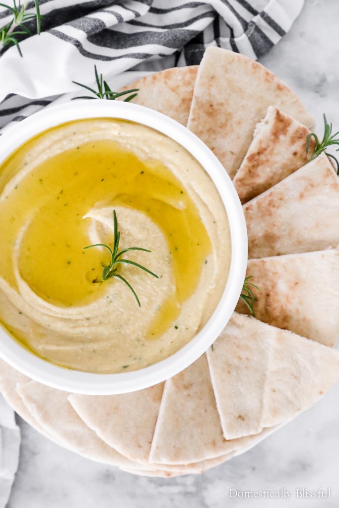 You only need 6 ingredients (no tahini) for this creamy Roasted Garlic Rosemary Hummus!