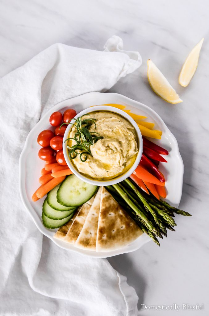 TThis Lemon Rosemary Hummus is bursting with fresh flavor & pairs perfectly with colorful vegetables & DASANI® Sparkling.