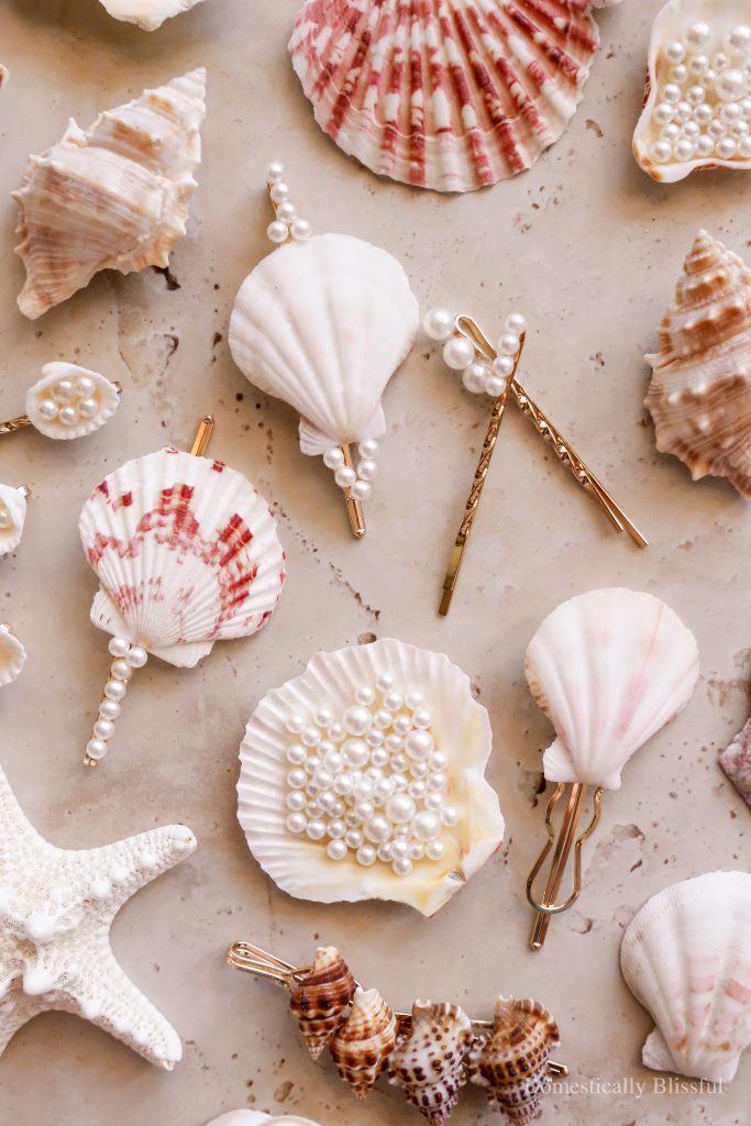 These DIY Seashell Hair Pins are a fun summer craft made with hair pins, seashells, and fake pearls.
