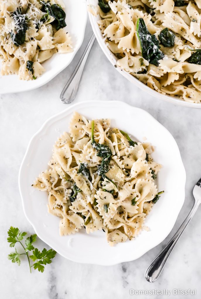 This Spinach Artichoke Pasta is an easy dinner recipe that is quick enough for a weeknight, yet so full of delicious flavors it is perfect for a dinner party. 