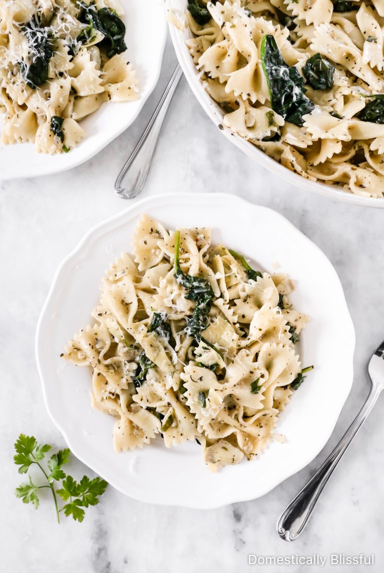 This Spinach Artichoke Pasta is an easy dinner recipe that is quick enough for a weeknight, yet so full of delicious flavors it is perfect for a dinner party.