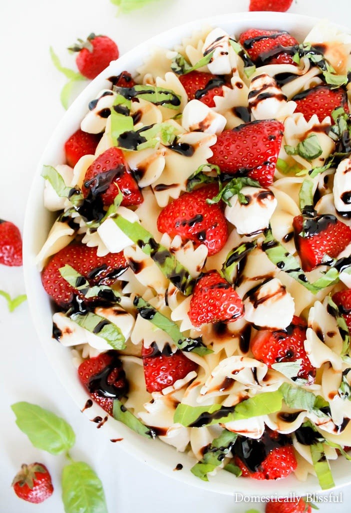 Strawberry Caprese Pasta Salad is overflowing with fresh flavor & is the perfect addition to any summer meal!