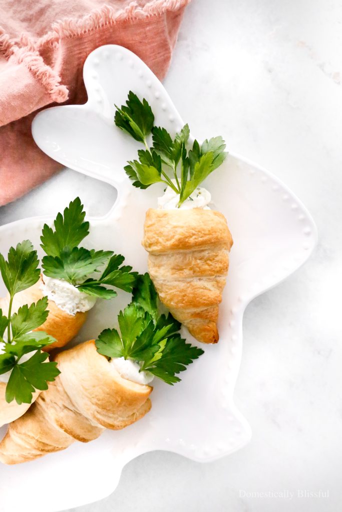 These Stuffed Crescent Roll Carrots are filled with Boursin, cream cheese, fresh parsley, and a squeeze of lemon. It is the perfect savory treat for an Easter brunch or spring party.