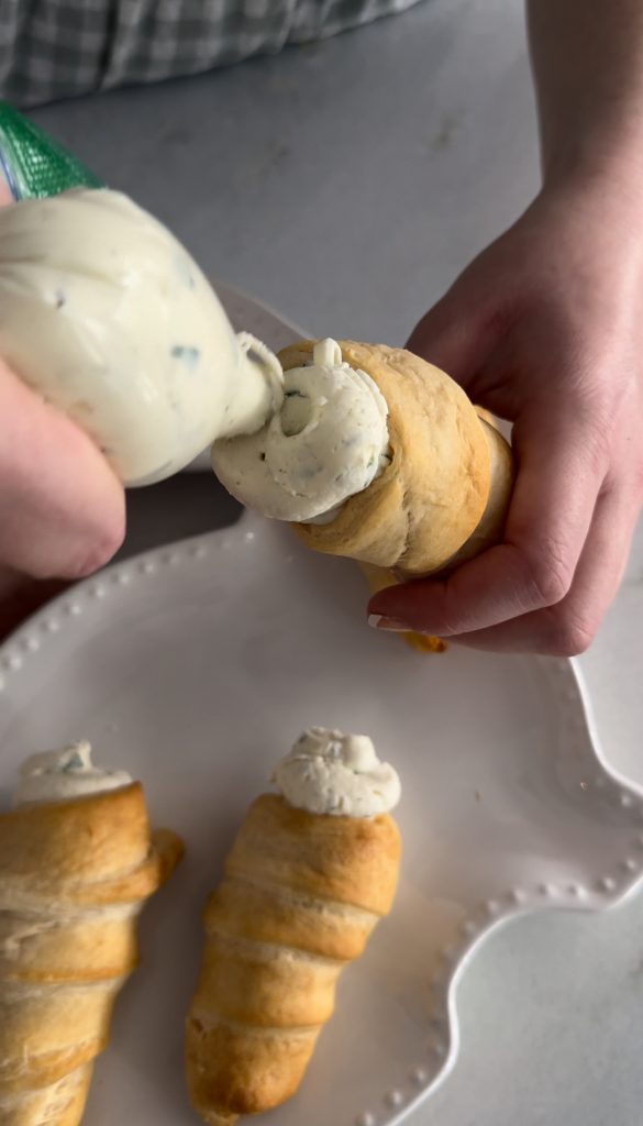These Stuffed Crescent Roll Carrots are filled with Boursin, cream cheese, fresh parsley, and a squeeze of lemon. It is the perfect savory treat for an Easter brunch or spring party.