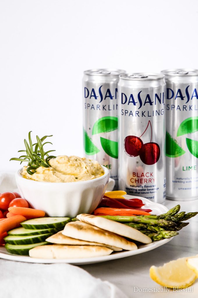 This Lemon Rosemary Hummus is bursting with fresh flavor & pairs perfectly with colorful vegetables & DASANI® Sparkling.