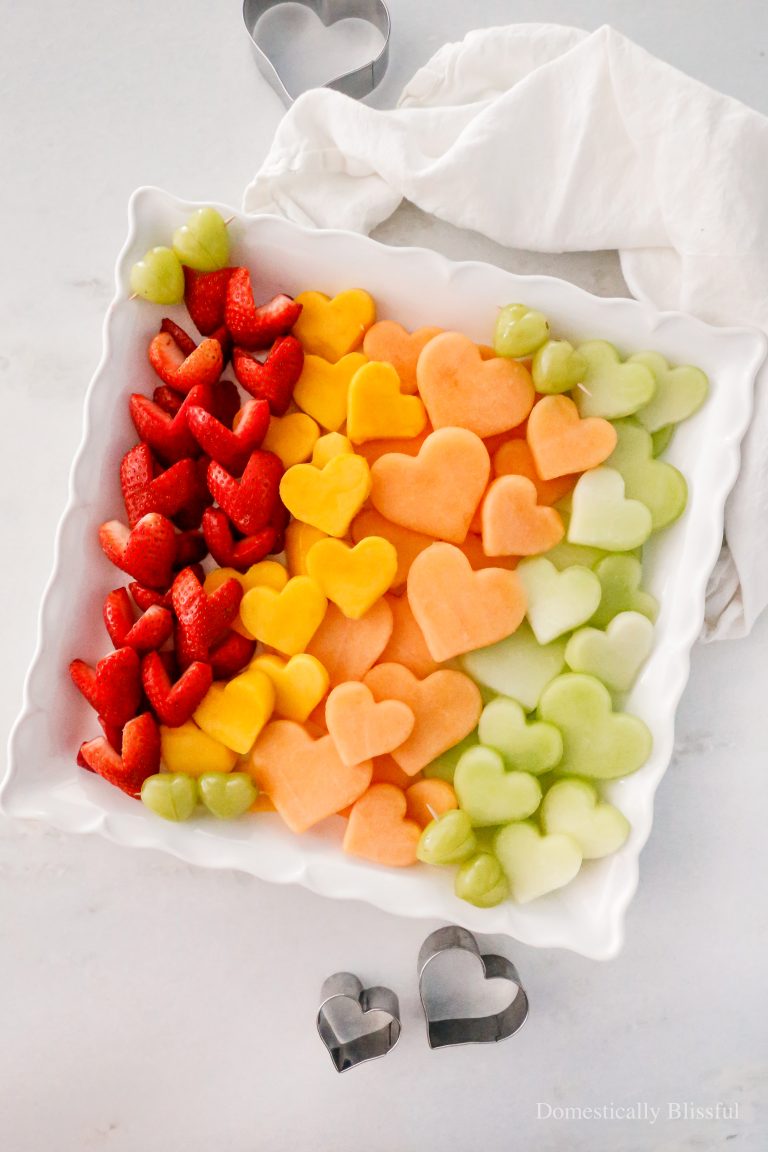 This simple Heart Fruit Board is the perfect fresh fruit treat for a wedding shower, Valentine's Day brunch, or Galentine's Day party.