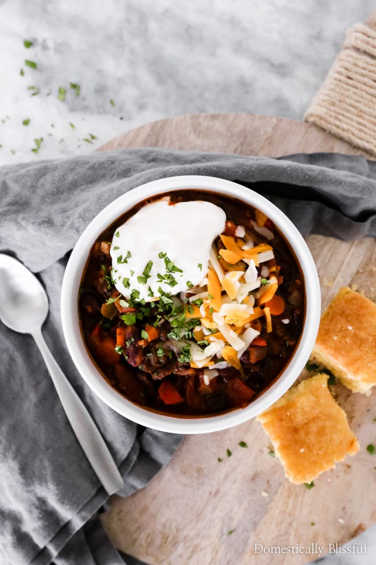 This Vegetarian Chili is filled with hearty flavors to keep you warm and cozy on a cold winter night!
