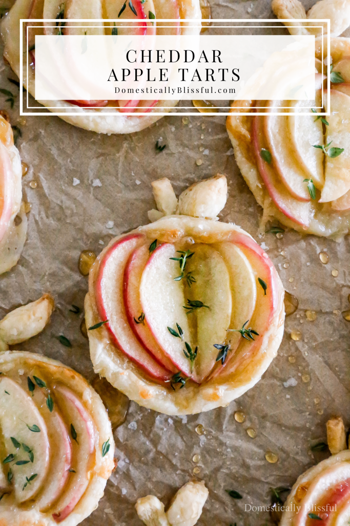 These cheesy Cheddar Apple Tarts are a savory treat perfect for fall parties, Friendsgiving gatherings, or Thanksgiving.