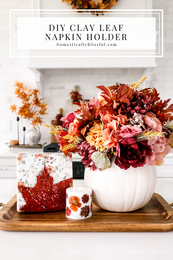 This DIY Clay Leaf Napkin Holder is a fun fall craft that makes a great gift and beautiful autumn decor for your kitchen.