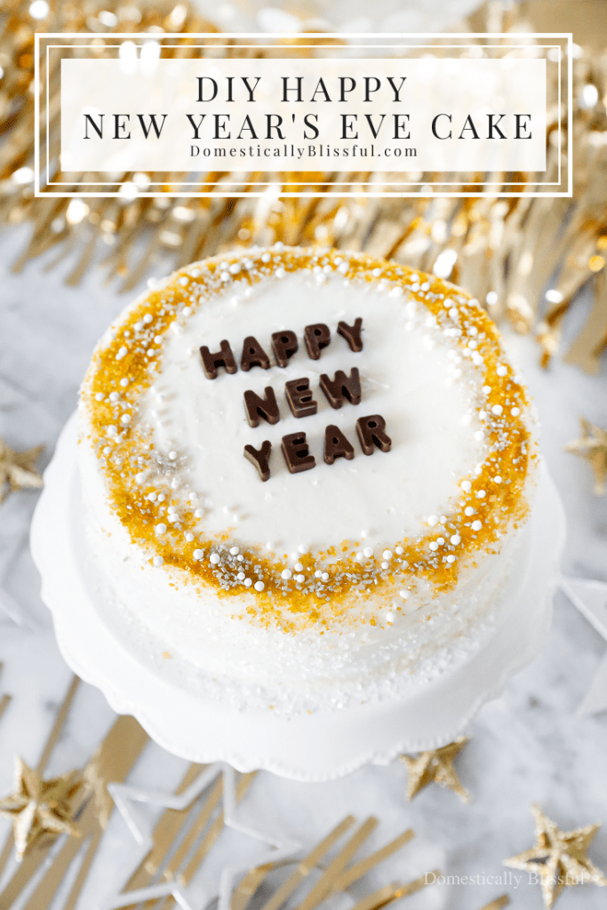 A quick and easy DIY Happy New Year's Eve Cake using a store-bought cake and redecorating it with gold, silver, and white sprinkles and chocolate letters.