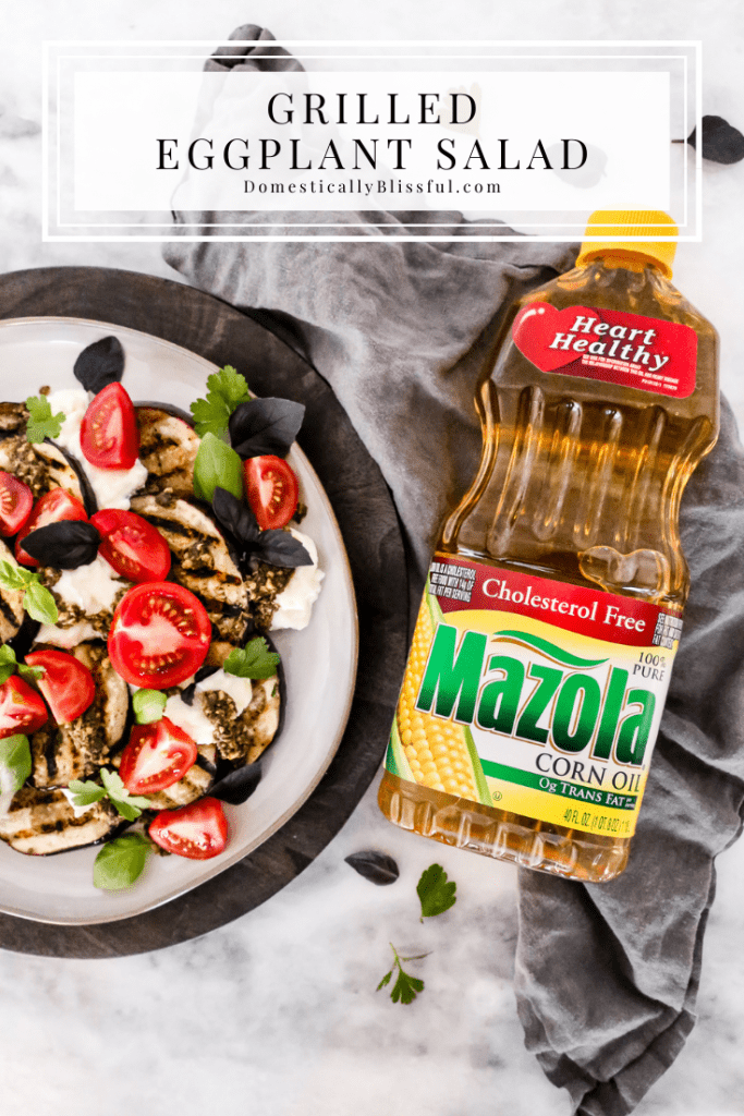 This Grilled Eggplant Salad is marinated, grilled, and topped with whipped ricotta, pesto, quartered tomatoes, and fresh herbs.