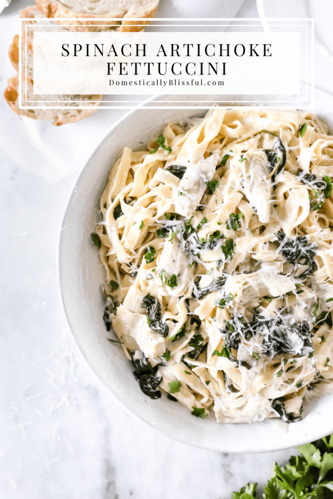 This Spinach Artichoke Fettuccini is made with fresh fettuccini topped with a creamy sauce filled with marinated artichoke hearts and spinach and topped with fresh parsley and grated parmesan.